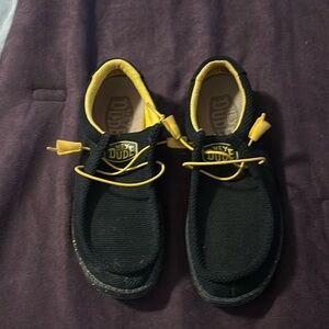 Hey Dudes Black and Yellow Wally Sox Slip Ons